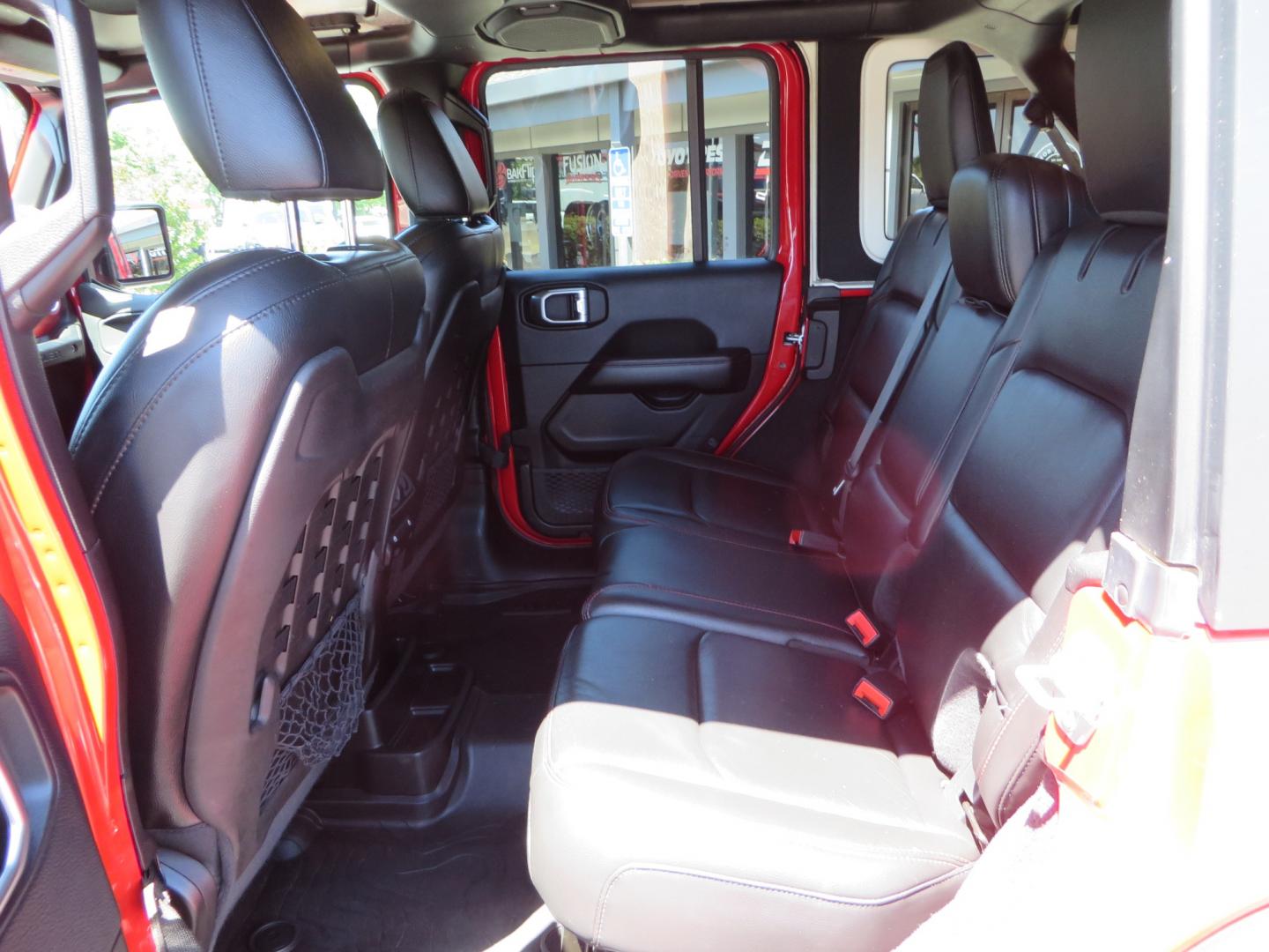 2019 Red /Black Jeep Wrangler Unlimited Rubicon (1C4HJXFN7KW) with an 2.0L L4 DOHC 16V TURBO engine, automatic transmission, located at 2630 Grass Valley Highway, Auburn, CA, 95603, (530) 508-5100, 38.937893, -121.095482 - Rubicon JL ready for all of your offroad adventures. This Jeep is sitting on a Rubicon Express lift kit, RE 2.5 Extreme series shocks, 17" Method bead grip wheels, 37" BFG KO2 tires, EVO front bumper, Warn winch, Road Armor rock slliders, and a HD Jeep spare tire carrier. - Photo#40